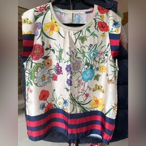 Floral Print Blouse with Striped Hem